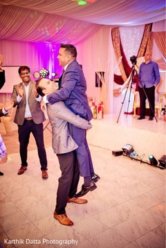 Indian groom with groomsmen celebrating. Indian groom with groomsmen celebrating.