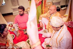 Gorgeous Indian bride and groom during their ceremony celebration. Gorgeous Indian bride and groom during their ceremony celebration.