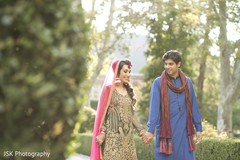 Sweet Indian bride and Indian groom holding hands. Sweet Indian bride and Indian groom holding hands.