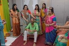 Joyful Indian groom at his haldi rituals. Joyful Indian groom at his haldi rituals.