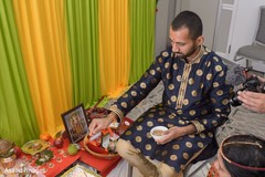 Indian groom making offerings at engagement rituals. Indian groom making offerings at engagement rituals.
