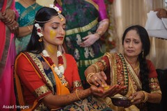 Indian bride with turmeric paste on her face. Indian bride with turmeric paste on her face.