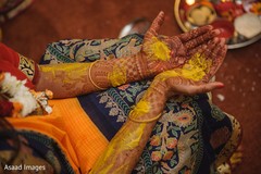 Maharani's hands with turmeric paste. Maharani's hands with turmeric paste.