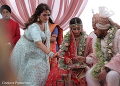 Indian bride and groom during the rituals Indian bride and groom during the rituals