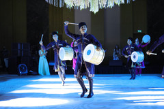 Dancer playing the dhol Dancer playing the dhol