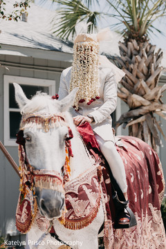 Indian groom riding baraat white horse Indian groom riding baraat white horse