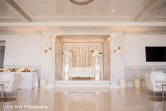 Elegant Indian wedding reception cream color sage decor. Elegant Indian wedding reception cream color sage decor.