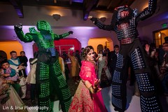 Adorable indian bride dancing at sangeet performance. Adorable indian bride dancing at sangeet performance.