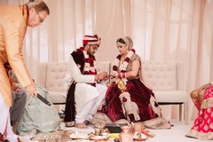 Sweet Indian couple exchanging rings. Sweet Indian couple exchanging rings.