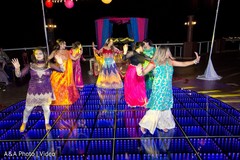 Indian bride dancing with bridesmaids on her sangeet celebration Indian bride dancing with bridesmaids on her sangeet celebration