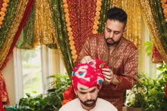 Enchanting Indian groom getting his turban on. Enchanting Indian groom getting his turban on.