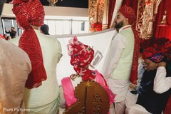 Indian groom being covered with the antarpat. Indian groom being covered with the antarpat.