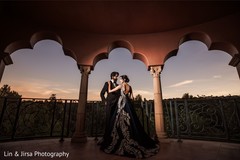Indian bride and groom posing for pictures Indian bride and groom posing for pictures