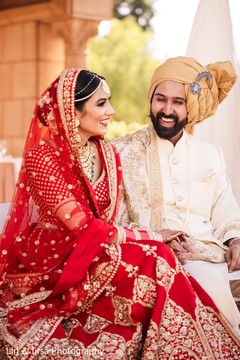 Indian bride and groom posing Indian bride and groom posing