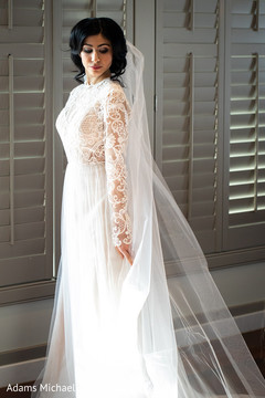 Sweet indian bride wearing a beautiful white dress Sweet indian bride wearing a beautiful white dress