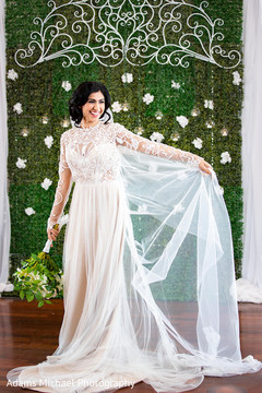 Indian bride posing with incredible wedding dress Indian bride posing with incredible wedding dress
