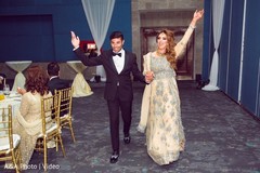 Indian newlyweds making their entrance to wedding reception Indian newlyweds making their entrance to wedding reception