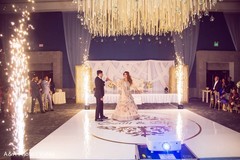 Indian bride and groom magical first dance scene Indian bride and groom magical first dance scene