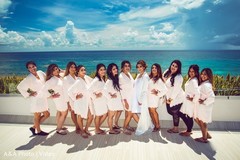 Indian bride and bridesmaids with a beautiful sky. Indian bride and bridesmaids with a beautiful sky.
