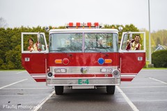Lovely Indian couple posing in a fire truck. Lovely Indian couple posing in a fire truck.