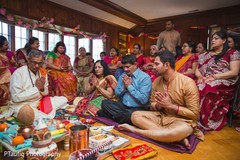 Indian groom's family with groom at pre-wedding ritual. Indian groom's family with groom at pre-wedding ritual.