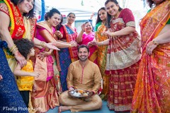 Charming Indian groom at his pre-wedding rituals. Charming Indian groom at his pre-wedding rituals.