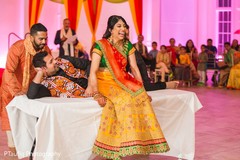 Joyful Indian bride at her sangeet celebration. Joyful Indian bride at her sangeet celebration.