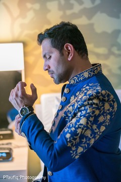 Rajah getting his watch on. Rajah getting his watch on.
