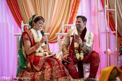Indian couple sharing their wedding vows. Indian couple sharing their wedding vows.