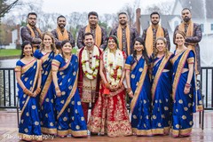 Enchanting indian lovebirds with bridesmaids and groomsmen outdoors. Enchanting indian lovebirds with bridesmaids and groomsmen outdoors.