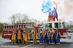 Incredible Indian couple on top of Fire truck. Incredible Indian couple on top of Fire truck.