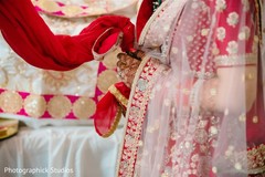 Indian bride holding the knot. Indian bride holding the knot.