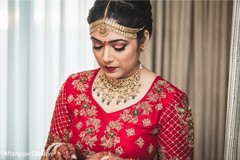 Lovely Indian bride with her ceremony jewelry on. Lovely Indian bride with her ceremony jewelry on.