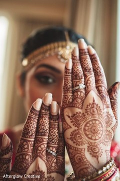 Indian bride showing her hands mehndi art. Indian bride showing her hands mehndi art.