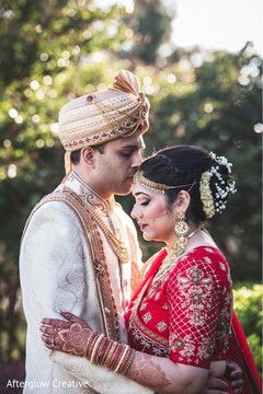 Indian groom kissing the bride to be. Indian groom kissing the bride to be.