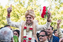 Indian groom being lifted up during baraat. Indian groom being lifted up during baraat.