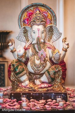 Take a look at his Indian wedding Ganesha Puja statue. Take a look at his Indian wedding Ganesha Puja statue.