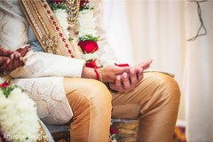Indian groom holding petals ritual. Indian groom holding petals ritual.
