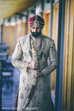 Indian groom holding the kirpan. Indian groom holding the kirpan.