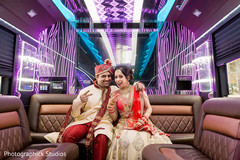 Gorgeous indian bride and groom enjoying the limo Gorgeous indian bride and groom enjoying the limo