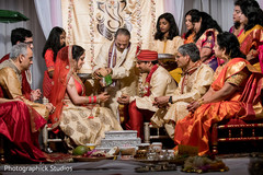 Indian newlyweds excited in their ceremony Indian newlyweds excited in their ceremony