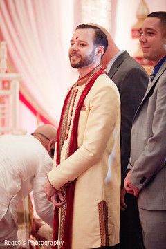 Joyful Indian groom at the ceremony. Joyful Indian groom at the ceremony.