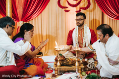 Parents during the ceremony. Parents during the ceremony.