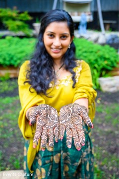 Enchanting Indian bride showing mehndi art Enchanting Indian bride showing mehndi art