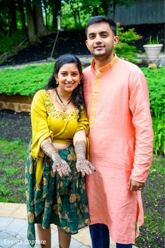 Sweet Indian couple at their mehndi party. c Sweet Indian couple at their mehndi party. c