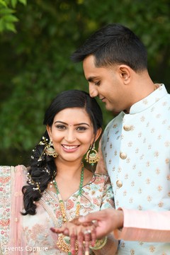Indian couple on their sangeet outfits. Indian couple on their sangeet outfits.