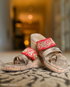 Closeup capture of Indian bridal ceremony shoes.