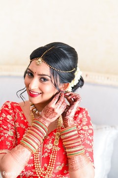 Enchanting Indian bride getting her jewelry on. Enchanting Indian bride getting her jewelry on.