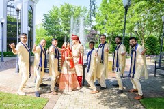 Elegant Indian couple and groomsmen outdoors capture. Elegant Indian couple and groomsmen outdoors capture.