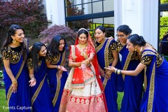Ravishing Indian bride and bridesmaids posing outdoors. Ravishing Indian bride and bridesmaids posing outdoors.